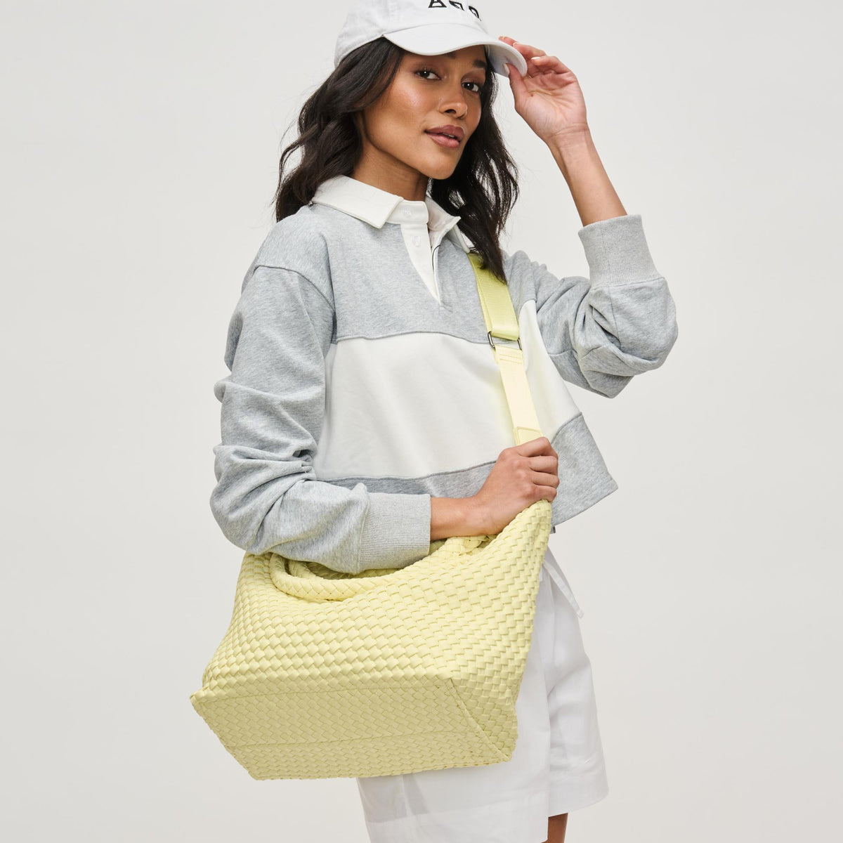 Woman wearing Butter Sol and Selene Sky&#39;s The Limit - Medium Butter Tote 841764111294 View 1 | Butter