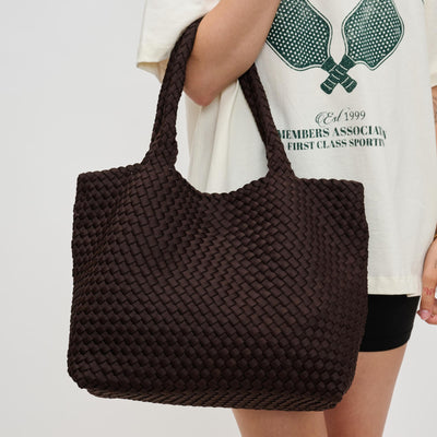 Woman wearing Chocolate Sol and Selene Sky's The Limit - Medium Chocolate Tote 841764111294 View 1 | Chocolate