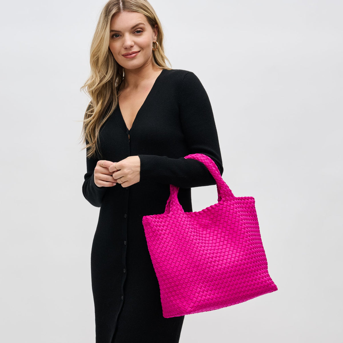 Woman wearing Fuchsia Sol and Selene Sky&#39;s The Limit - Medium Fuchsia Tote 841764111294 View 2 | Fuchsia