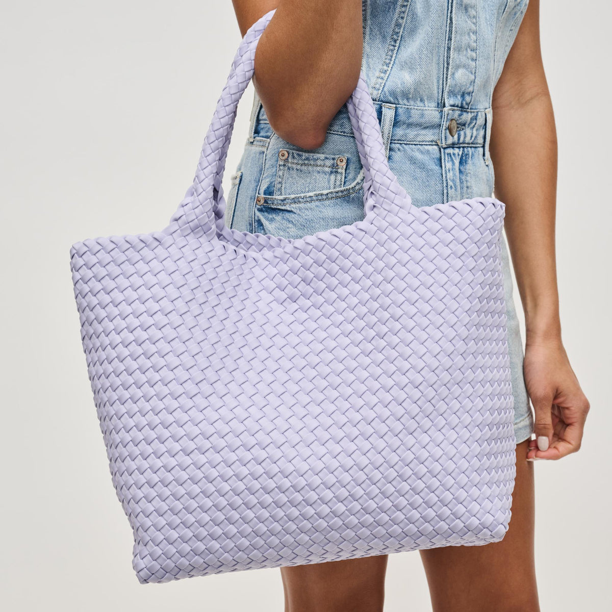 Woman wearing Lilac Sol and Selene Sky&#39;s The Limit - Medium Lilac Tote 841764111294 View 1 | Lilac