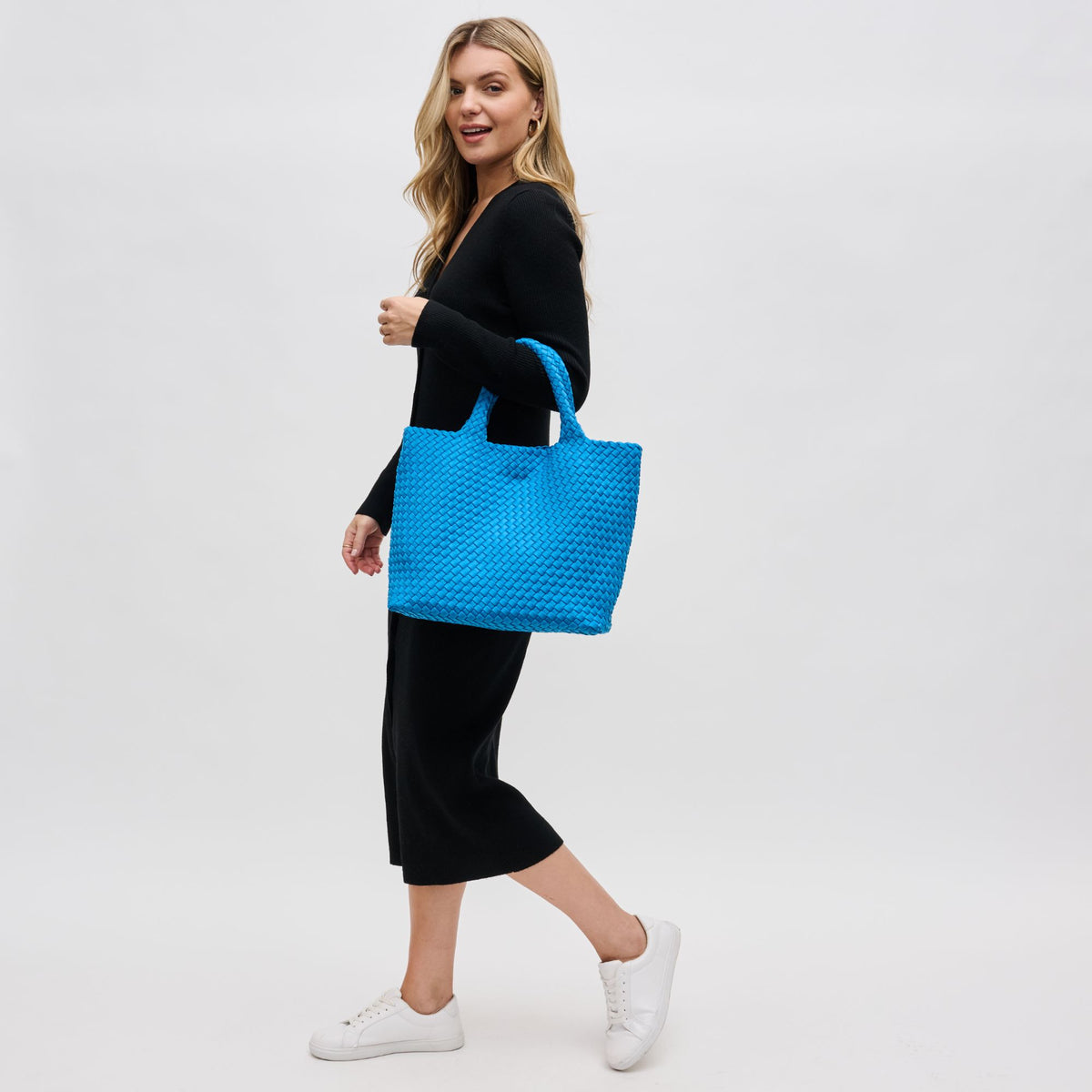 Woman wearing Ocean Sol and Selene Sky&#39;s The Limit - Medium Ocean Tote 841764111294 View 3 | Ocean