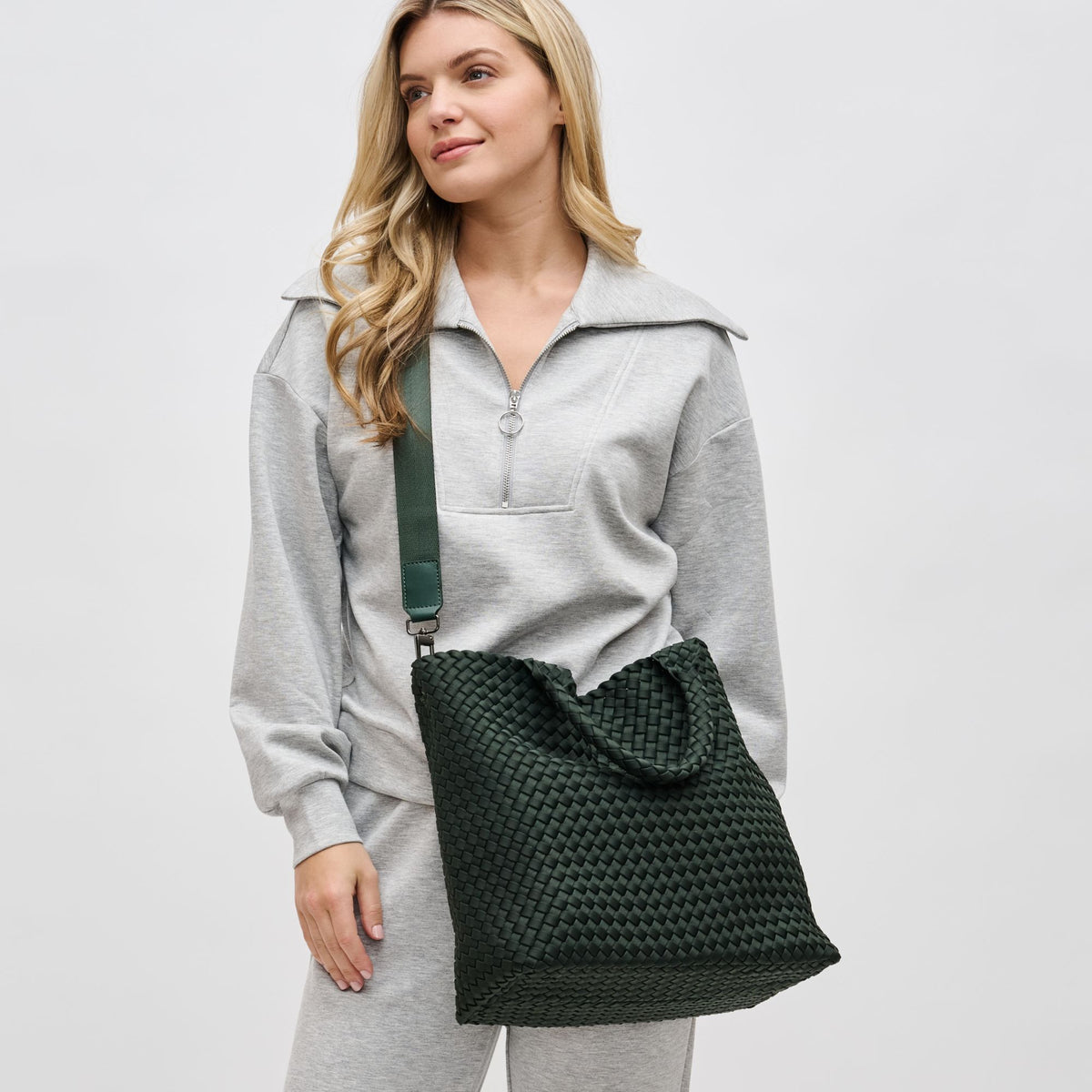 Woman wearing Olive Sol and Selene Sky&#39;s The Limit - Medium Olive Tote 841764111294 View 2 | Olive