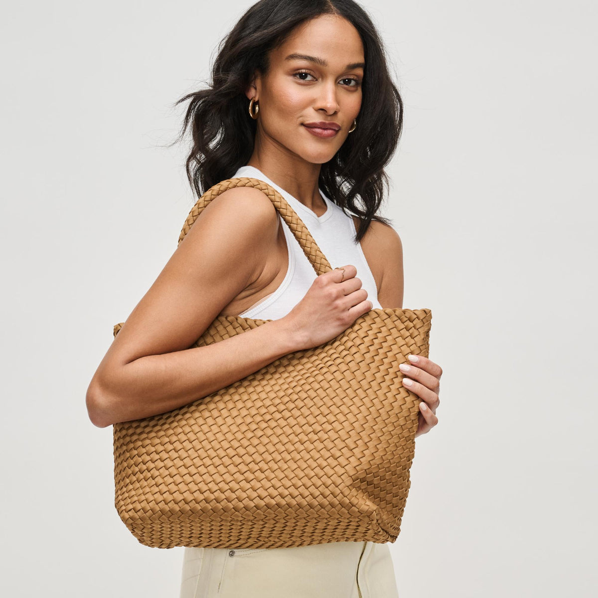 Woman wearing Sand Sol and Selene Sky&#39;s The Limit - Medium Sand Tote 841764111294 View 2 | Sand