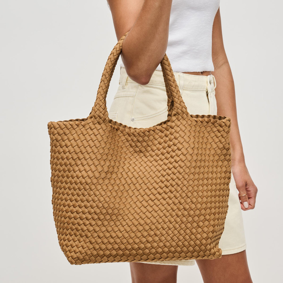 Woman wearing Sand Sol and Selene Sky&#39;s The Limit - Medium Sand Tote 841764111294 View 1 | Sand