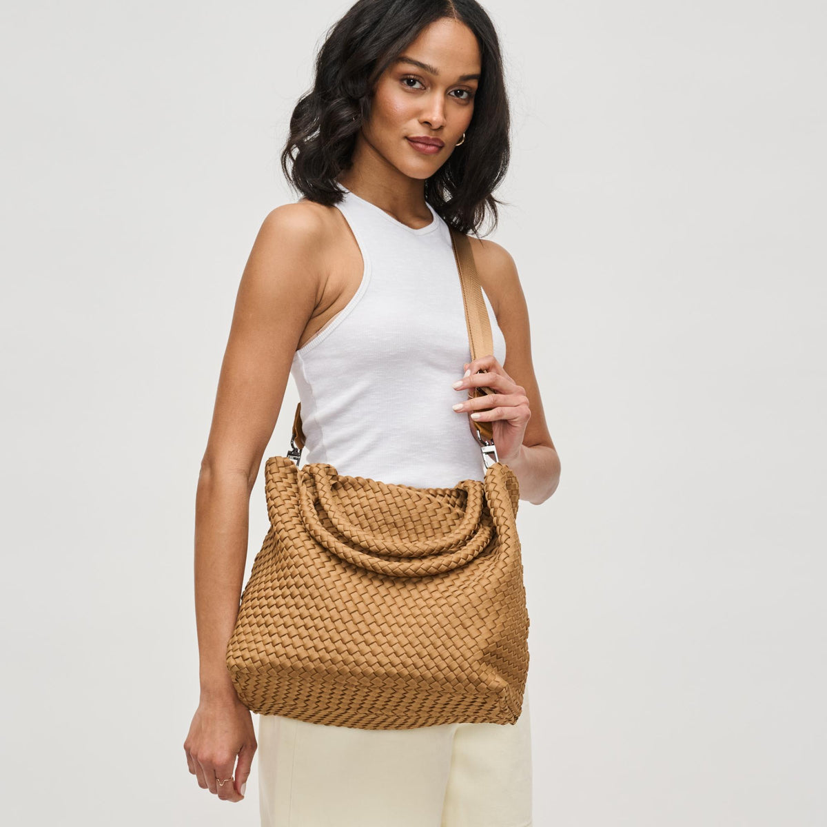 Woman wearing Sand Sol and Selene Sky&#39;s The Limit - Medium Sand Tote 841764111294 View 3 | Sand