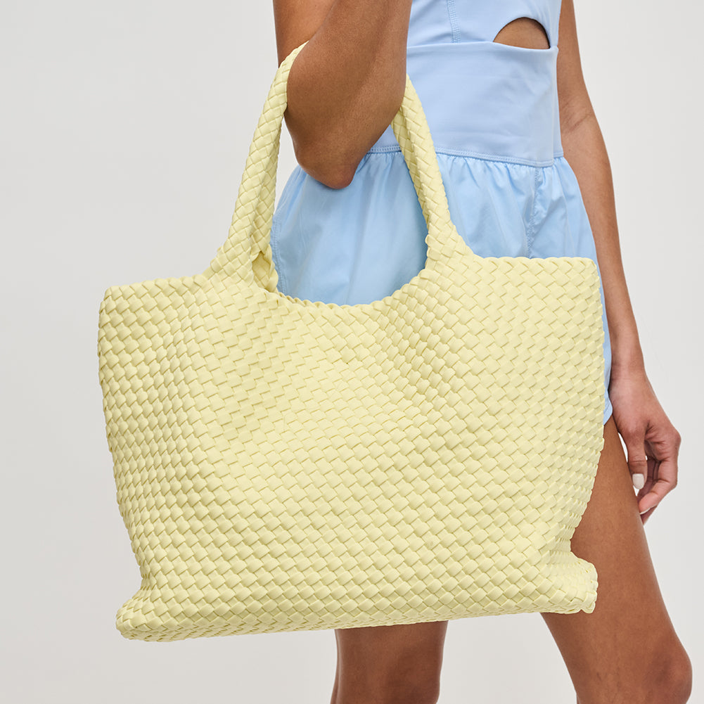 Woman wearing Butter Sol and Selene Sky&#39;s The Limit - Large Tote 841764110242 View 4 | Butter