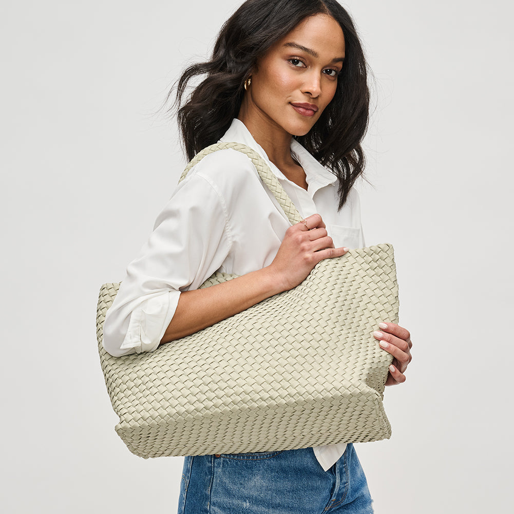 Woman wearing Sage Sol and Selene Sky&#39;s The Limit - Large Tote 841764110242 View 1 | Sage