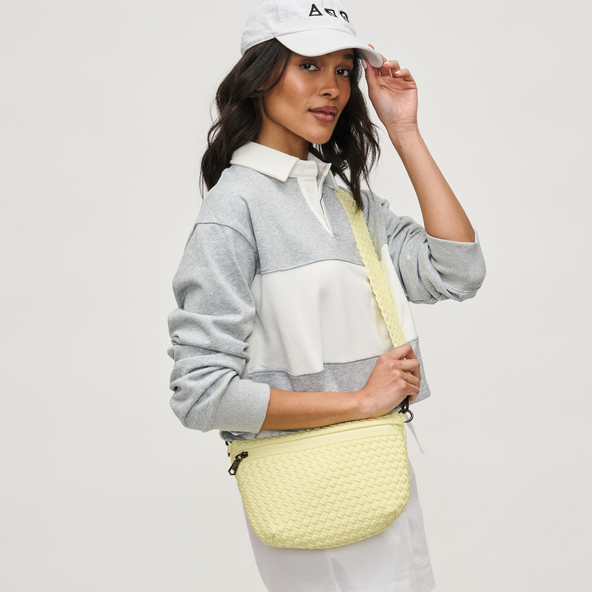 Woman wearing Butter Sol and Selene Ethereal - Woven Neoprene Crossbody 841764110907 View 1 | Butter