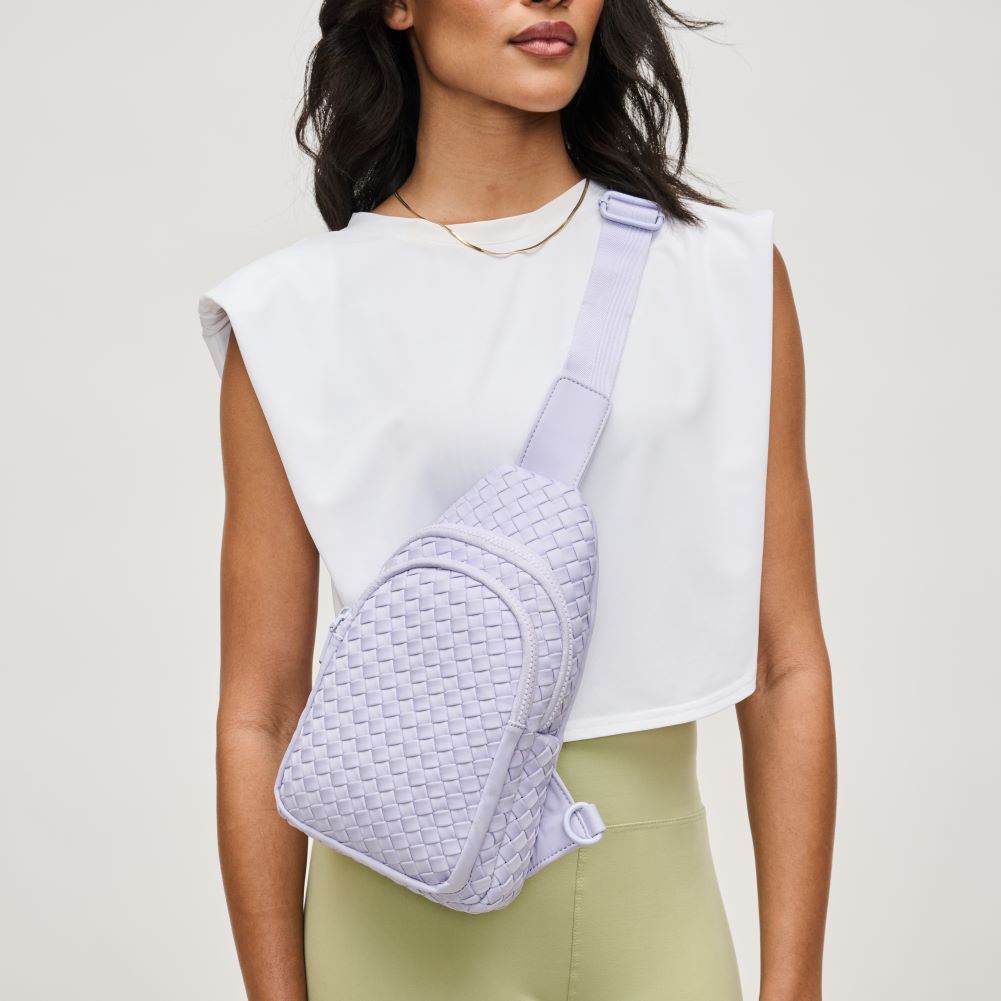 Woman wearing Lilac Sol and Selene Beyond The Horizon - Woven Neoprene Sling Backpack 841764108034 View 1 | Lilac