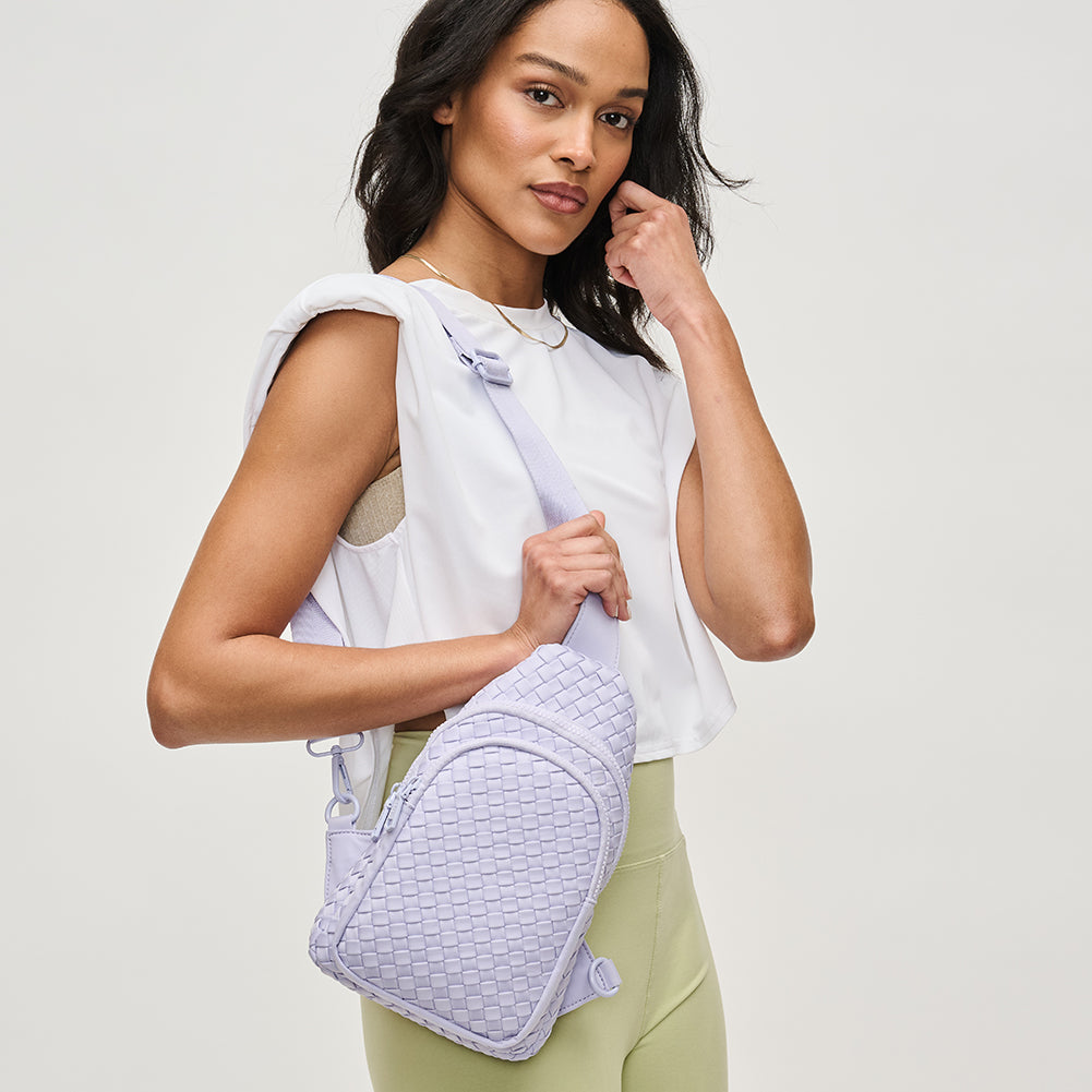 Woman wearing Lilac Sol and Selene Beyond The Horizon - Woven Neoprene Sling Backpack 841764108034 View 2 | Lilac