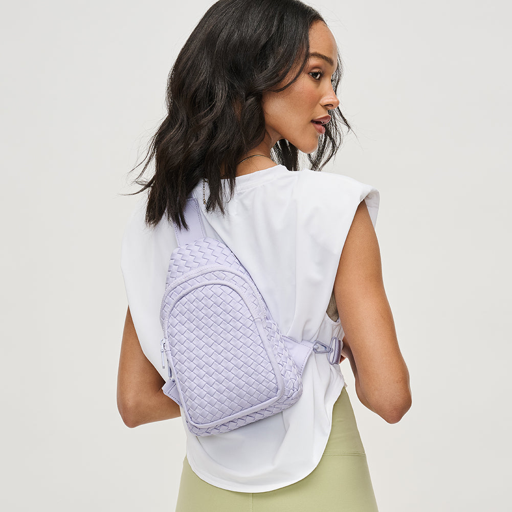 Woman wearing Lilac Sol and Selene Beyond The Horizon - Woven Neoprene Sling Backpack 841764108034 View 4 | Lilac