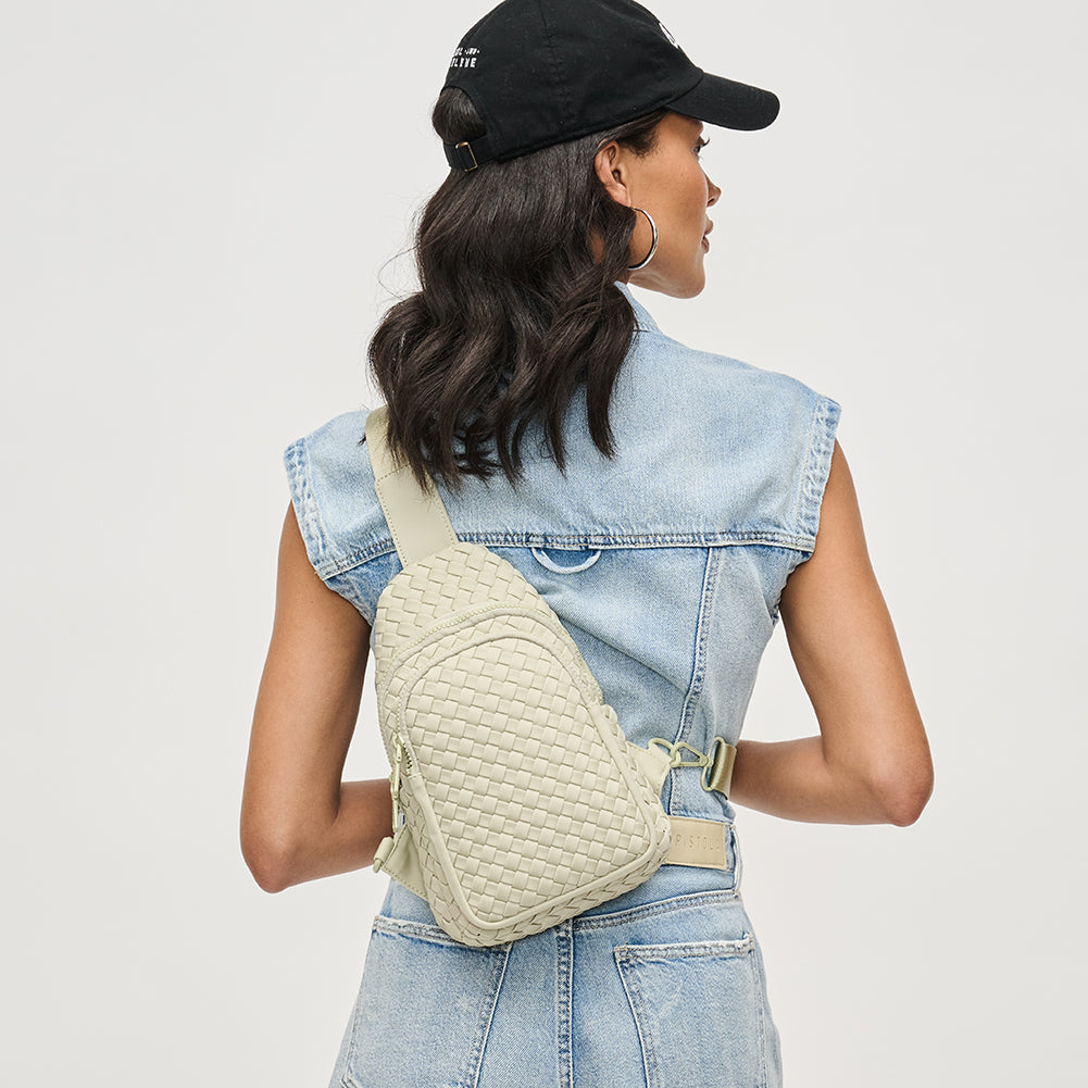 Woman wearing Sage Sol and Selene Beyond The Horizon - Woven Neoprene Sling Backpack 841764108034 View 3 | Sage