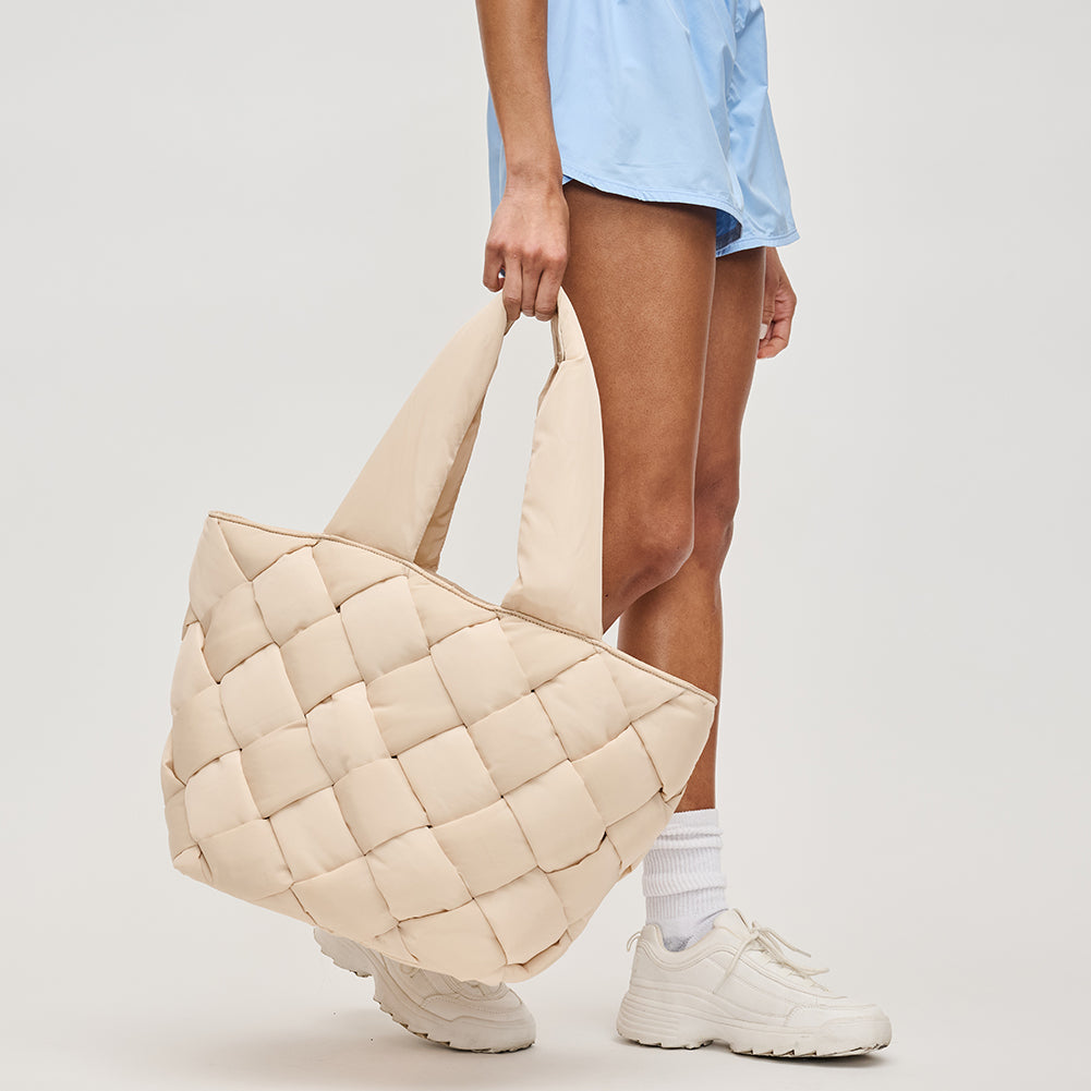 Woman wearing Sol and Selene Intuition East West Tote 841764107310 View 3 | Cream