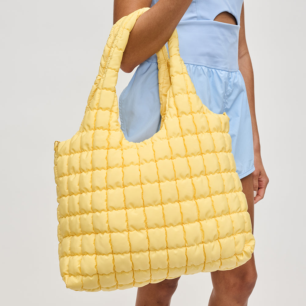 Woman wearing Sol and Selene Elevate Hobo 841764111874 View 4 | Butter