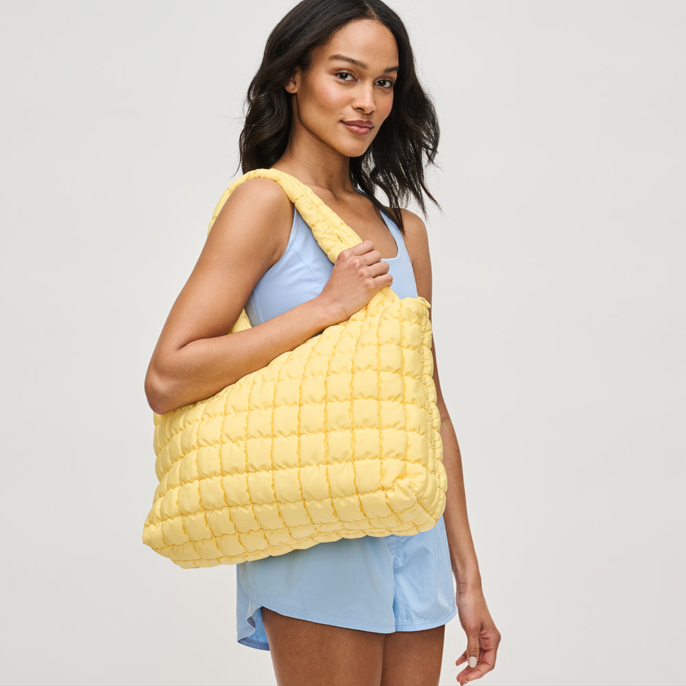 Woman wearing Sol and Selene Elevate Hobo 841764111874 View 2 | Butter