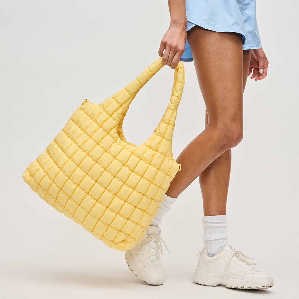 Woman wearing Sol and Selene Elevate Hobo 841764111874 View 1 | Butter