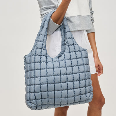 Woman wearing Sol and Selene Elevate Hobo 841764111898 View 1 | Slate Sky