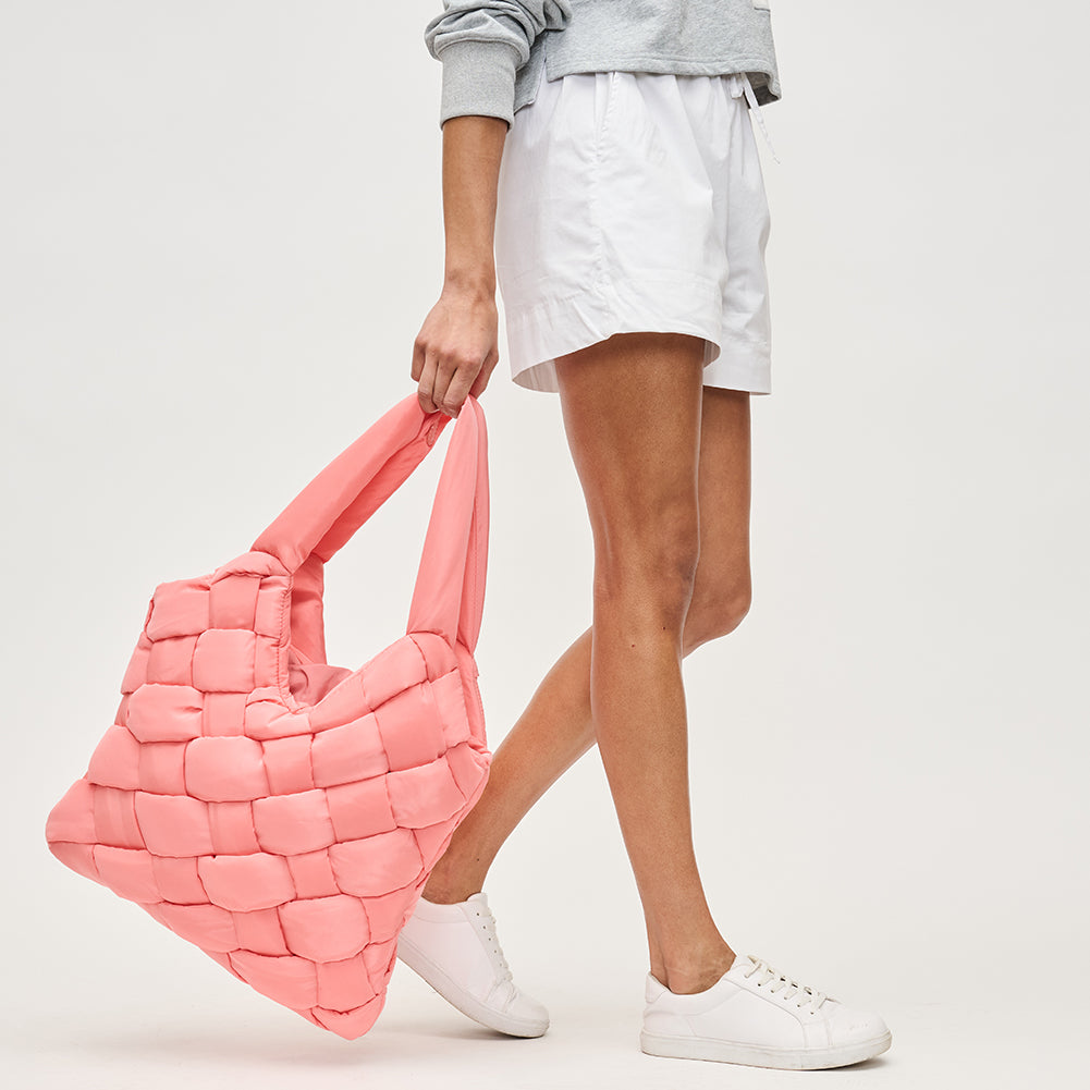 Woman wearing Sol and Selene Illumine Tote 841764111911 View 2 | Salmon