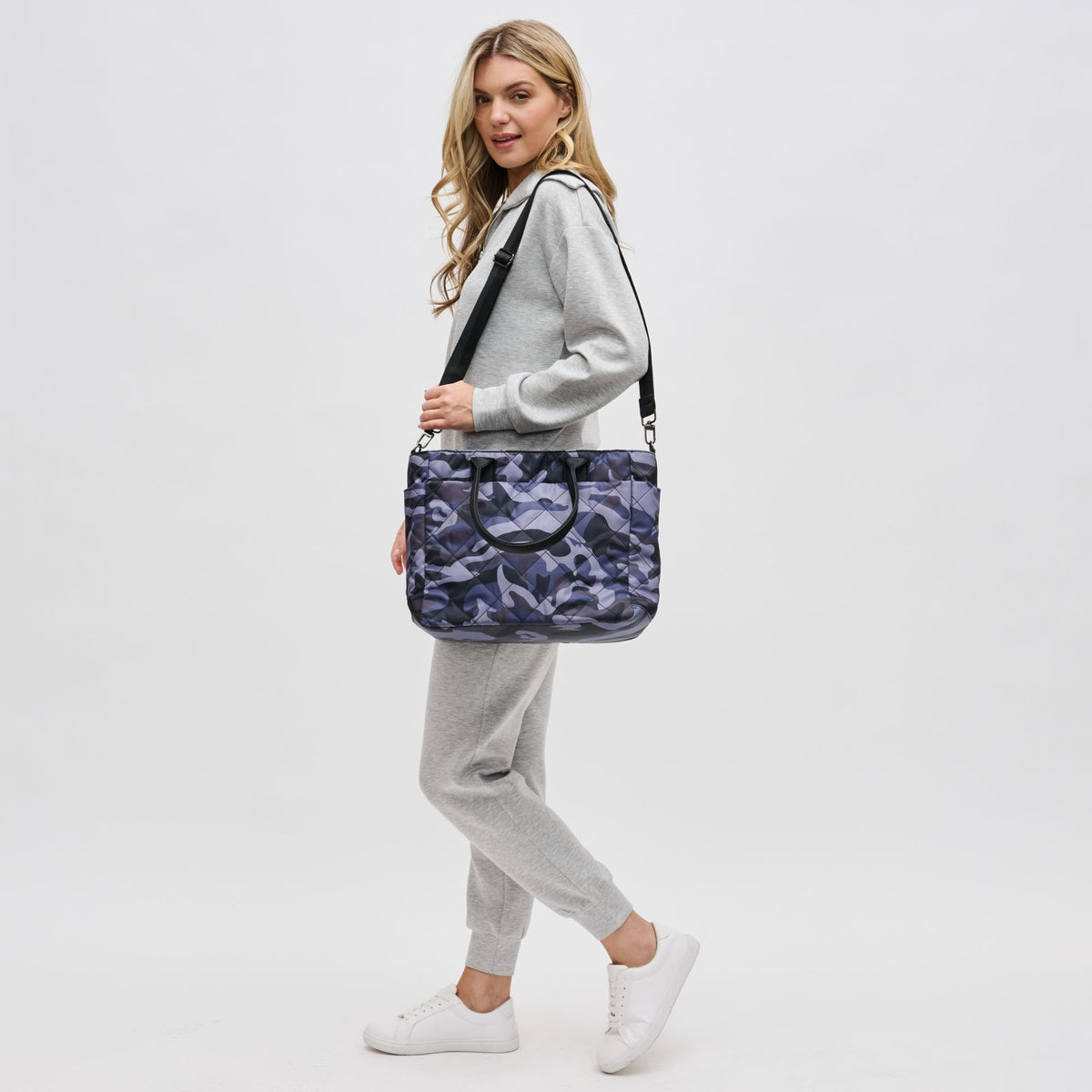 Woman wearing Purple Haze Sol and Selene Motivator East West Tote 841764105705 View 2 | Purple Haze