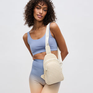 Woman wearing Cream Sol and Selene Beyond The Horizon - Woven Neoprene Sling Backpack 841764109277 View 3 | Cream