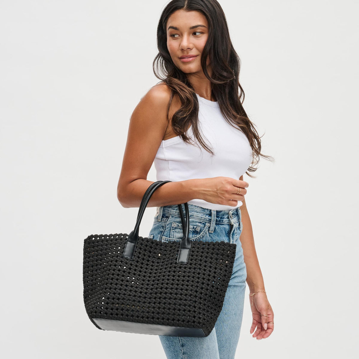 Woman wearing Black Sol and Selene Solstice - Medium Tote 841764109932 View 1 | Black