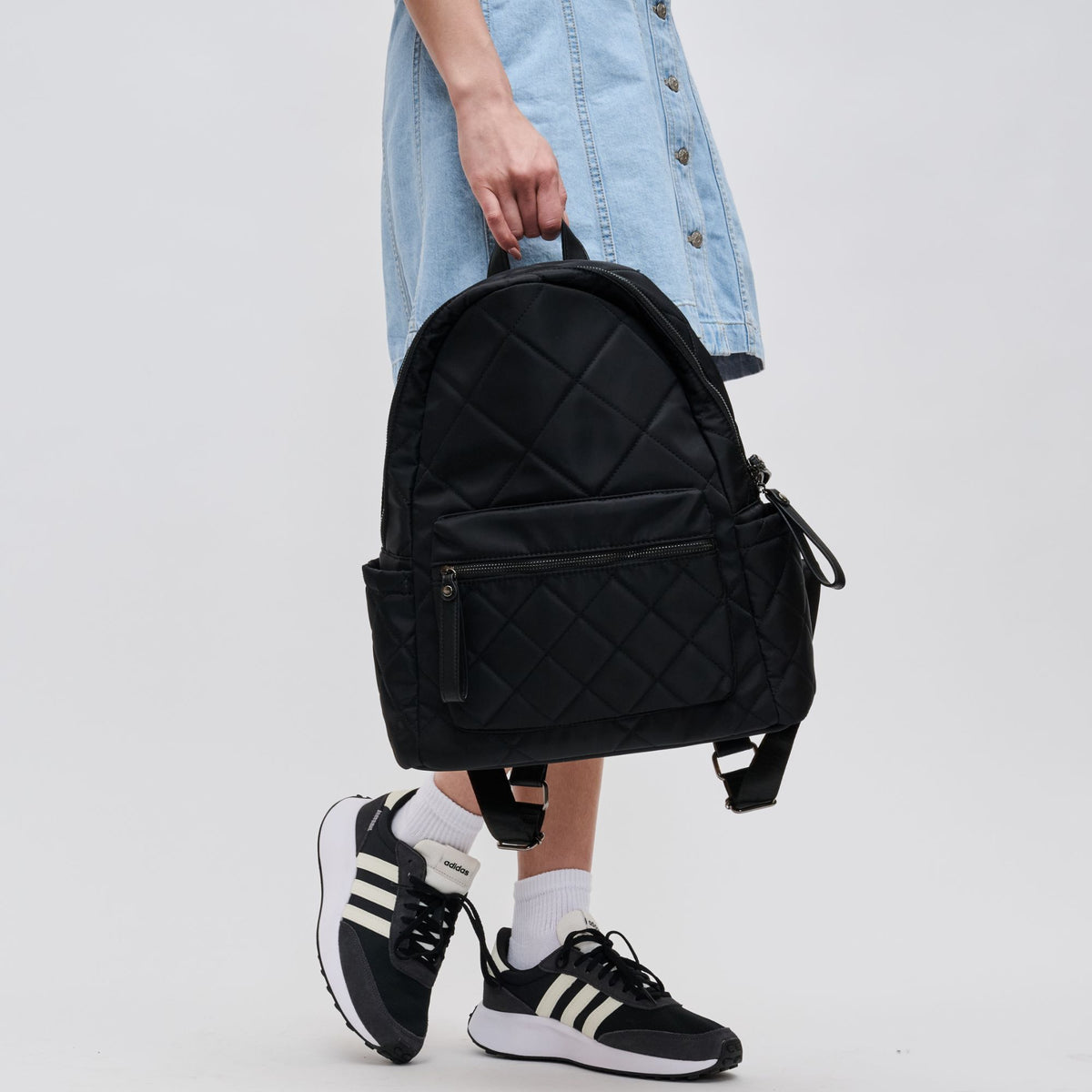 Woman wearing Black Sol and Selene Motivator - Medium Backpack 841764100076 View 4 | Black