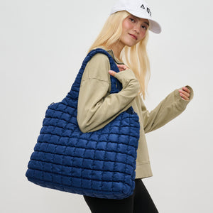 Woman wearing Navy Sol and Selene Elevate Hobo 841764110556 View 1 | Navy