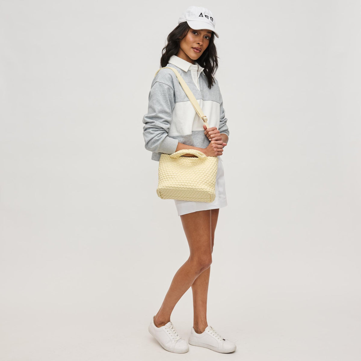 Woman wearing Butter Sol and Selene Sky&#39;s The Limit - Small Sustainable Crossbody 841764111706 View 4 | Butter