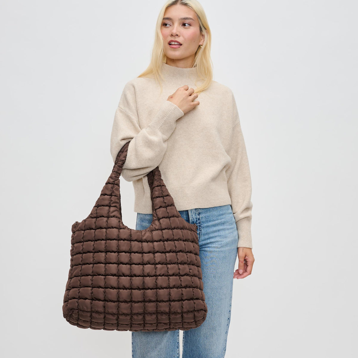 Woman wearing Brown Sol and Selene Elevate Hobo 841764110532 View 1 | Brown