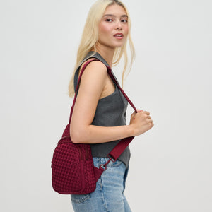 Woman wearing Wine Sol and Selene Beyond The Horizon - Woven Neoprene Sling Backpack 841764110457 View 3 | Wine