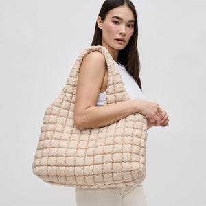 Woman wearing Cream Sol and Selene Elevate Hobo 841764109390 View 1 | Cream