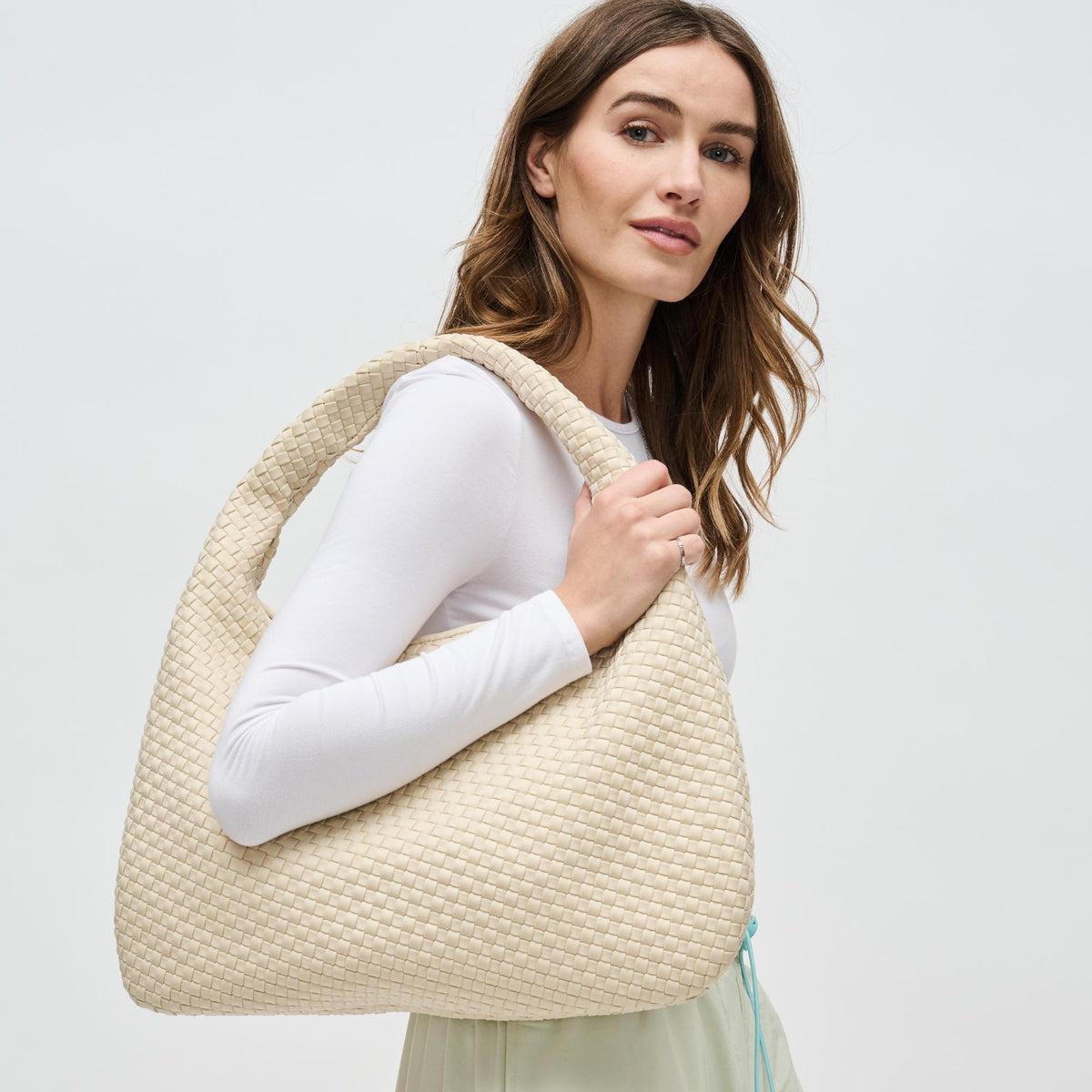 Woman wearing Cream Sol and Selene Dare to Dream - Large Woven Neoprene Hobo 841764110921 View 1 | Cream