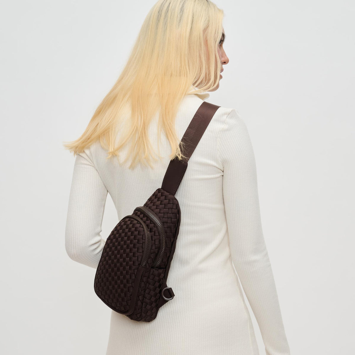 Woman wearing Chocolate Sol and Selene Beyond The Horizon - Woven Neoprene Sling Backpack 841764110440 View 4 | Chocolate