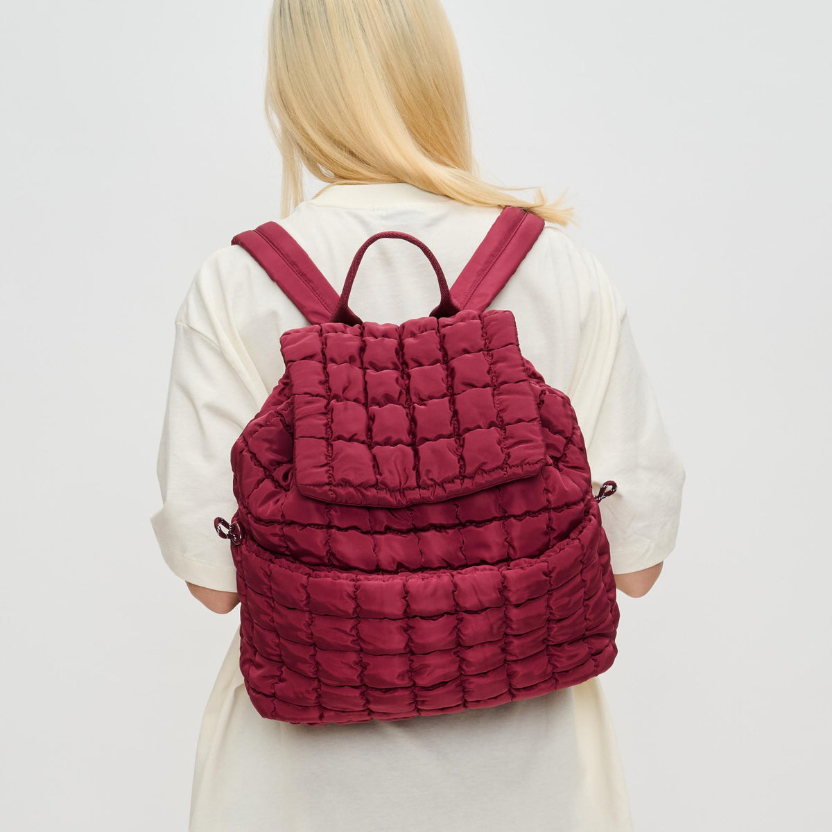 Woman wearing Burgundy Sol and Selene Vitality Backpack 841764110662 View 4 | Burgundy