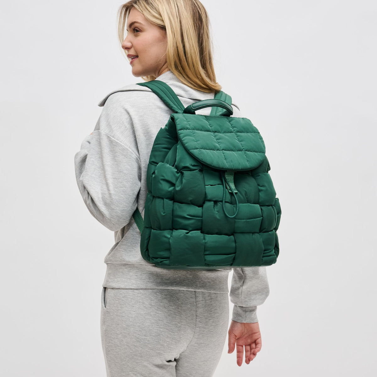 Woman wearing Emerald Sol and Selene Perception Backpack 841764107761 View 2 | Emerald