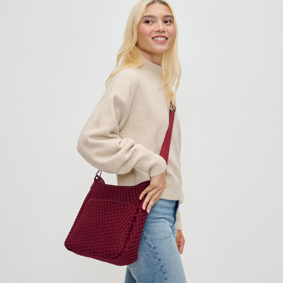 Woman wearing Wine Sol and Selene Kismet - Woven Neoprene Crossbody 841764110181 View 1 | Wine