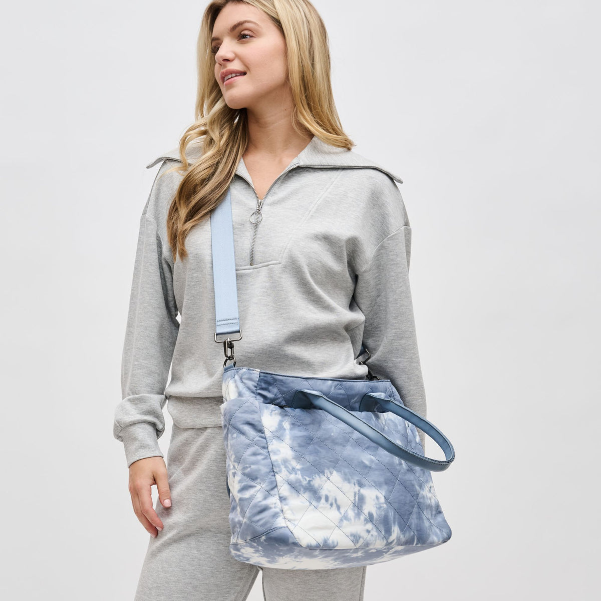 Woman wearing Slate Cloud Sol and Selene Motivator East West Tote 841764106337 View 3 | Slate Cloud