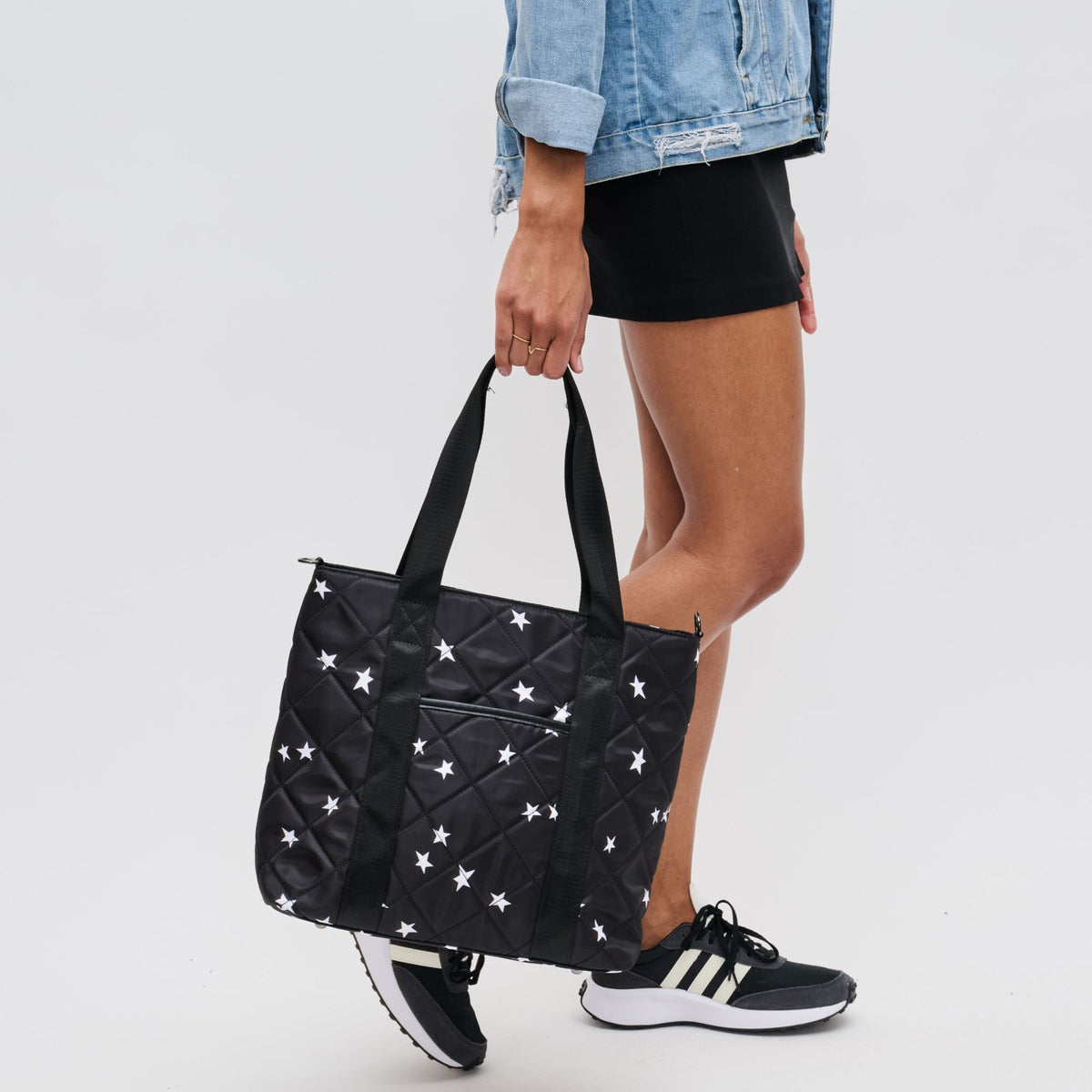 Woman wearing Black Star Sol and Selene Motivator Carryall Tote 841764106931 View 2 | Black Star