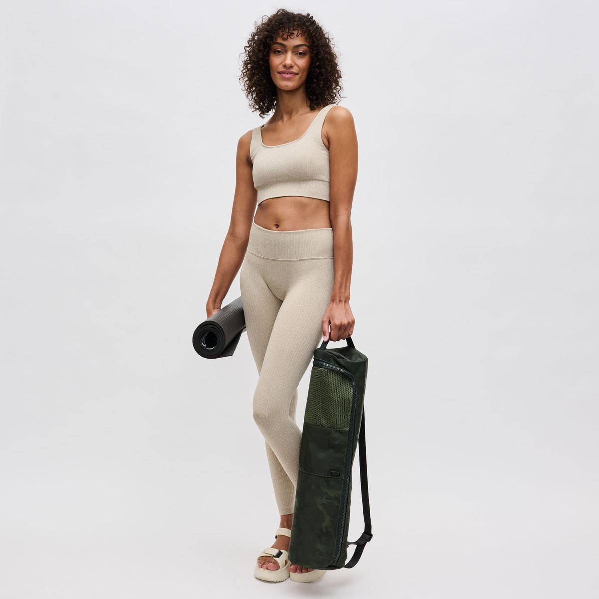 Woman wearing Olive Camo Sol and Selene Karma - Camo Print Yoga Mat Bag 841764100816 View 4 | Olive Camo