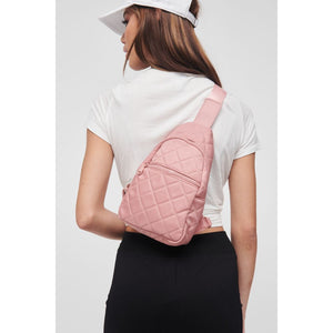 Woman wearing Pastel Pink Sol and Selene Motivator Sling Backpack 841764106863 View 1 | Pastel Pink