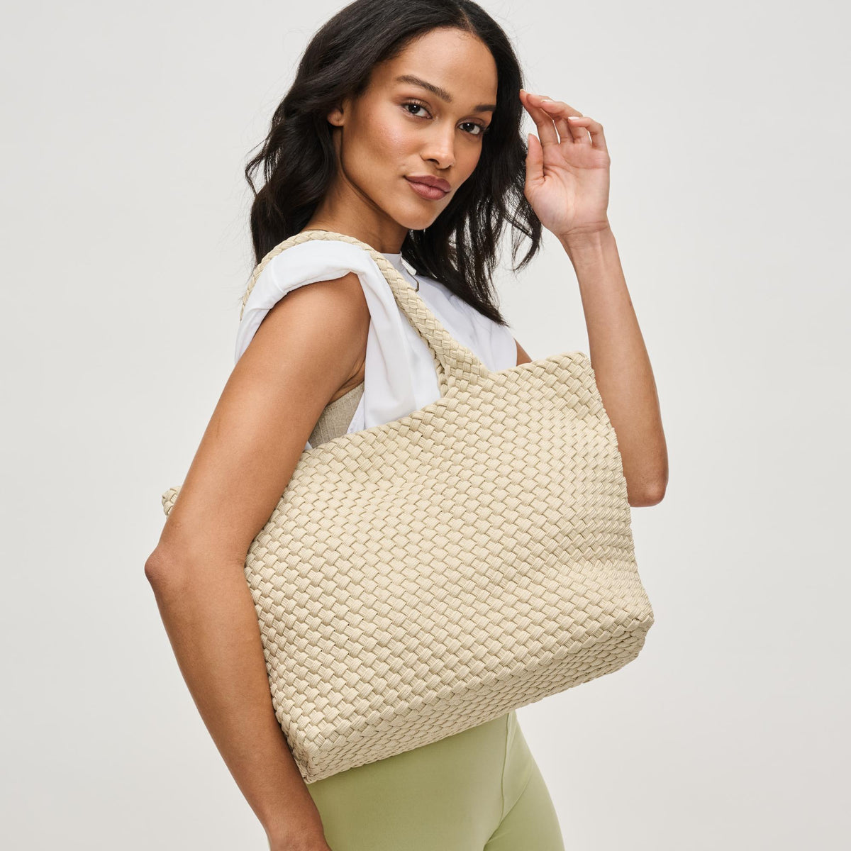 Woman wearing Beige Sol and Selene Sky&#39;s The Limit - Medium Sustainable Tote 841764111584 View 2 | Beige