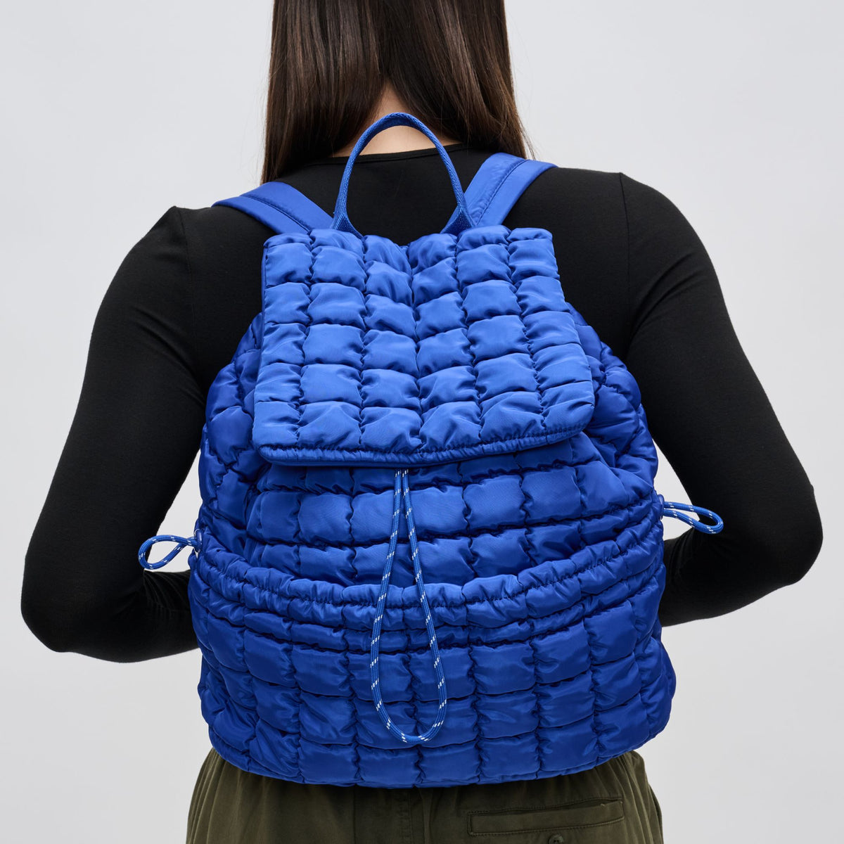 Woman wearing Cobalt Sol and Selene Vitality Backpack 841764108522 View 2 | Cobalt