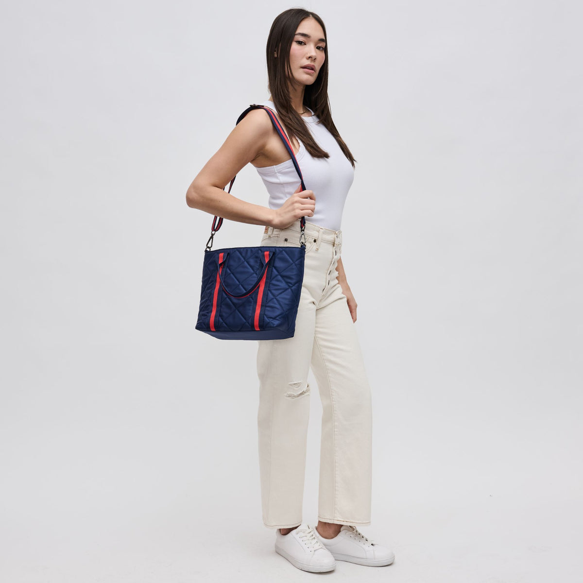 Woman wearing Navy Sol and Selene Motivator Mini Tote Mini Tote 841764106511 View 3 | Navy