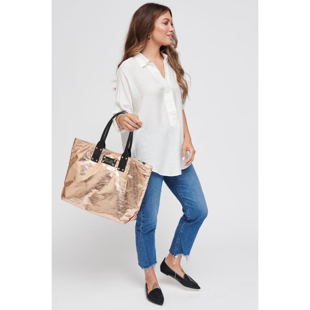 Woman wearing Rose Gold Metallic Sol and Selene It Girl Tote 841764105088 View 4 | Rose Gold Metallic