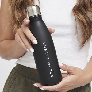 Woman wearing Matte Black Sol and Selene Water Bottle Water Bottle 841764102254 View 1 | Matte Black