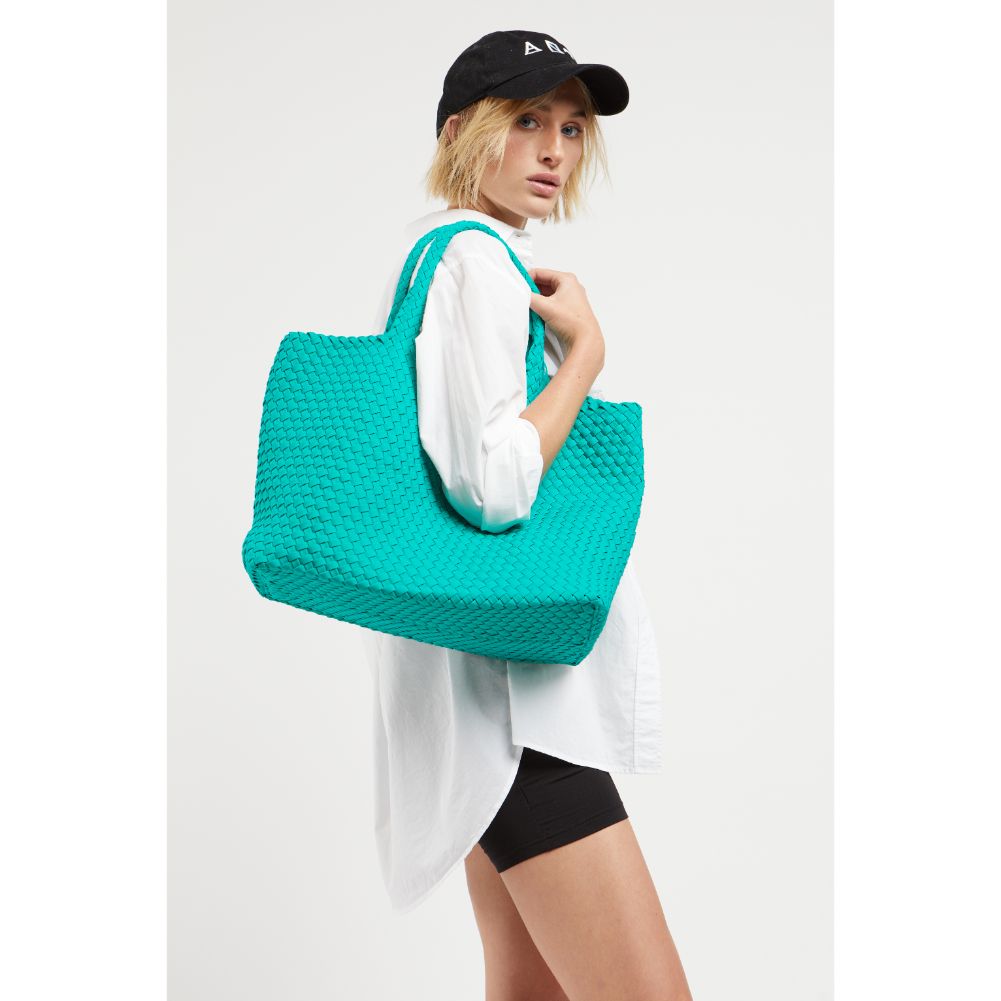 Woman wearing Emerald Sol and Selene Sky&#39;s The Limit - Large Tote 841764107853 View 1 | Emerald