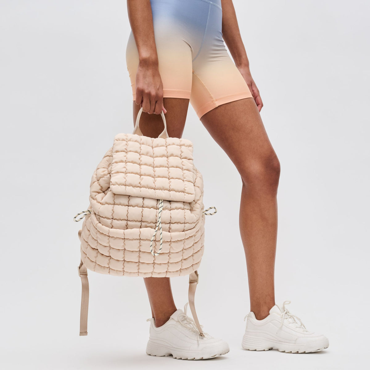 Woman wearing Cream Sol and Selene Vitality Backpack 841764109888 View 4 | Cream