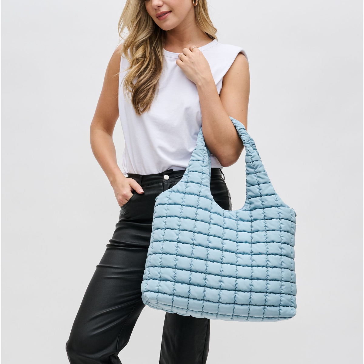 Woman wearing Sky Blue Sol and Selene Elevate Hobo 841764109406 View 1 | Sky Blue