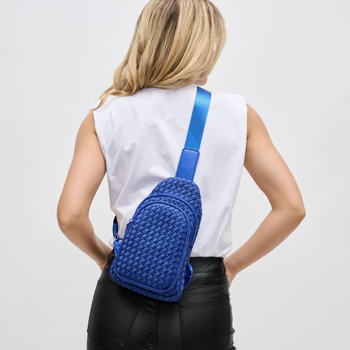 Woman wearing Royal Blue Sol and Selene Beyond The Horizon - Woven Neoprene Sling Backpack 841764108096 View 2 | Royal Blue