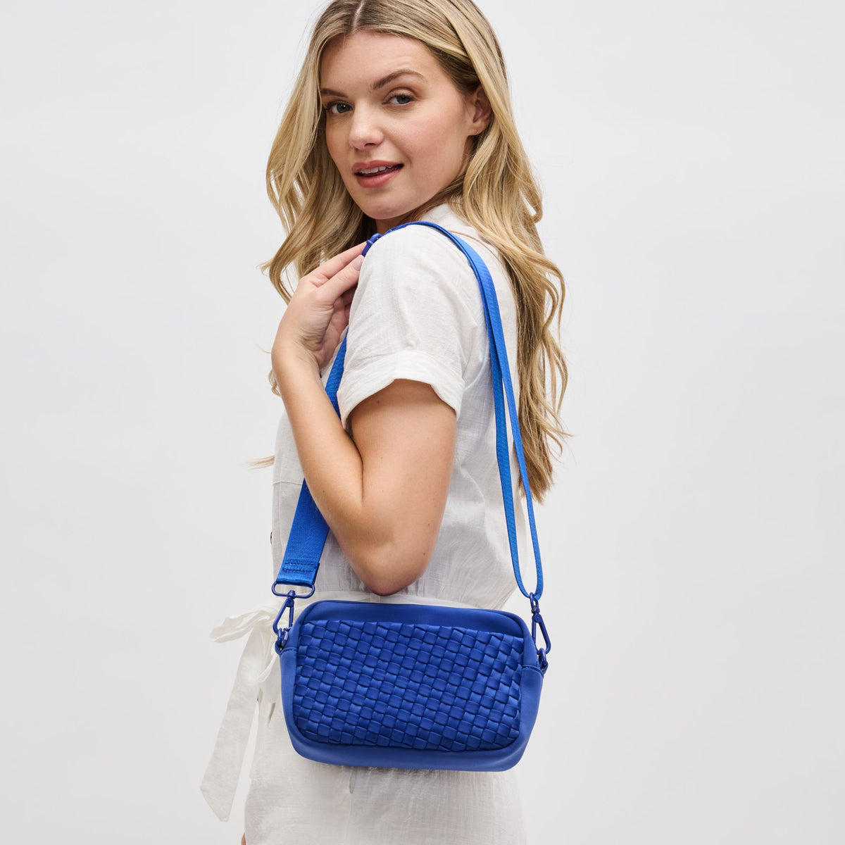 Woman wearing Royal Blue Sol and Selene Inspiration - Woven Neoprene Crossbody 841764108362 View 2 | Royal Blue